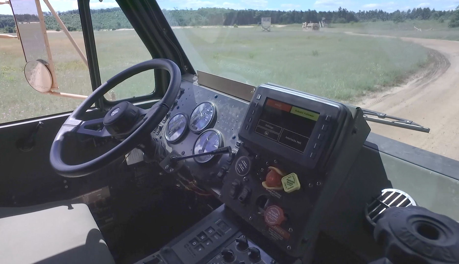 Inside the Leader Follower Program vehicle in action with no operator